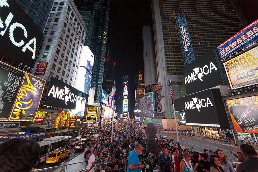 Midnight Moment: Alfredo Jaar, A Logo for America, August 1-31, 2014; 11:57-midnight, every night. Photograph by Ka-Man Tse for @TSqArts. Midnight Moment is a presentation of the Times Square Advertising Coalition (TSAC) and Times Square Arts. This month in in collaboration with the Solomon R. Guggenheim Museum. Midnight Moment: A Digital Gallery is the largest coordinated effort in history by the sign operators in Times Square to display synchronized, cutting-edge creative content at the same time every day.