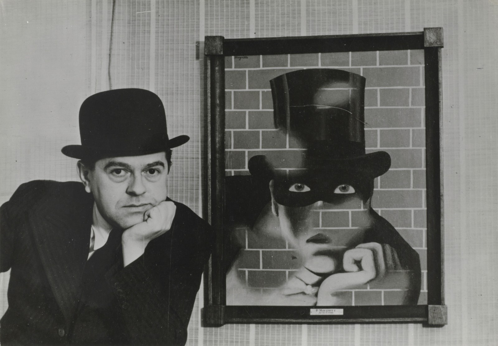 Photographer unknown. René Magritte and Le Barbare (The Barbarian), 1938. Gelatin silver print; 18.8 × 25 cm (7 3/8 × 9 7/8 in.). The Baltimore Museum of Art. Purchase with exchange funds from the Edward Joseph Gallagher III Memorial Collection; and partial gift of George H. Dalsheimer, Baltimore (BMA.1988.440). © Charly Herscovici—ADAGP—ARS, 2014