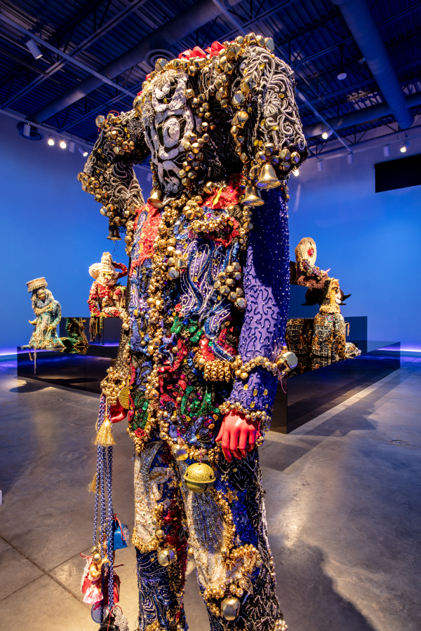 Installation view, Ceremonial Alien of Metal Exits, 2017. Raúl de Nieves (Mexican, b. 1983). Vintage sequin appliqués, thread, glue, plastic beads, plastic dolls, ribbons, cardboard, silk, metal bells, chains, and mannequin; dimensions variable. Courtesy of the artist and Company Gallery, New York. Photo courtesy Howard Agriesti, the Cleveland Museum of Art