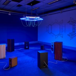 Haroon Mirza, ‘Lectures in Theology’, 2019-2020, 24-channel electrical signals for Hi-Fi speakers and LEDs, steel, electrical wire, bespoke media device, carpet, and wall painting. Commissioned and produced by Samdani Art Foundation and Lisson Gallery for DAS 2020. Courtesy of the artist, Samdani Art Foundation, and Lisson Gallery. Photo: Randhir Singh.